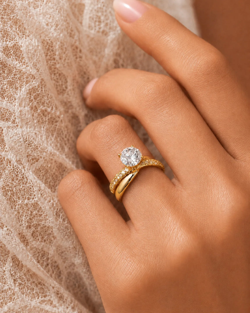 D colorless round moissanite ring with brilliant side stones set in 18K yellow gold | SARATTI