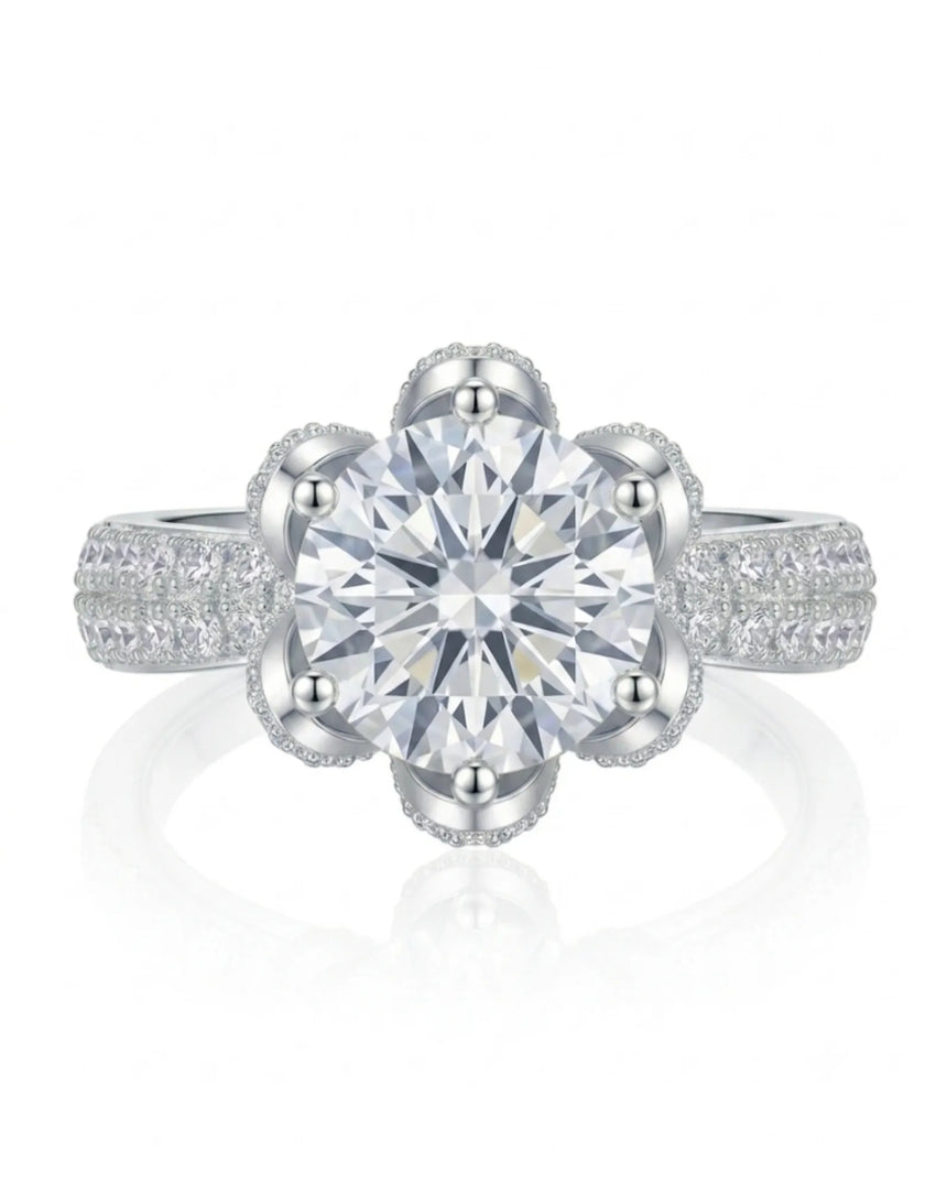 D colorless round moissanite ring with hidden halo and pavé side stones in platinum | SARATTI