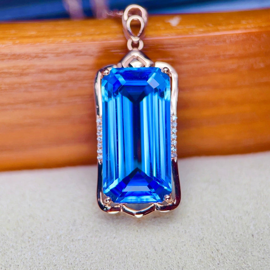 December Birthstone Blue Topaz Oval Pendant in Rose Gold | SARATTI