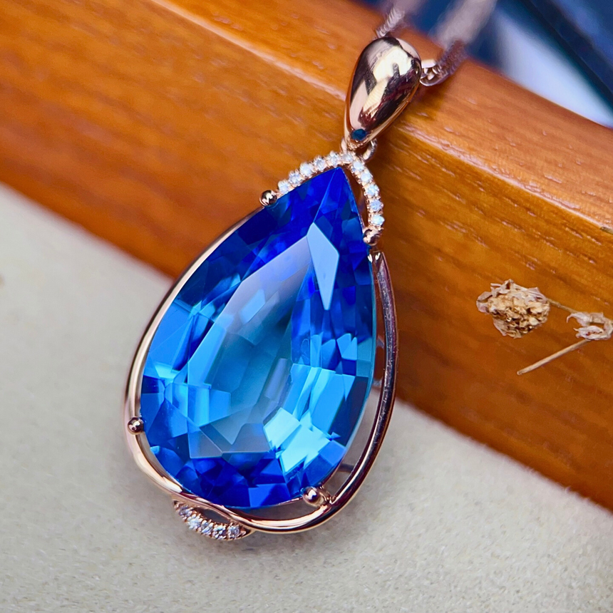 Luxury pear cut blue topaz pendant necklace design