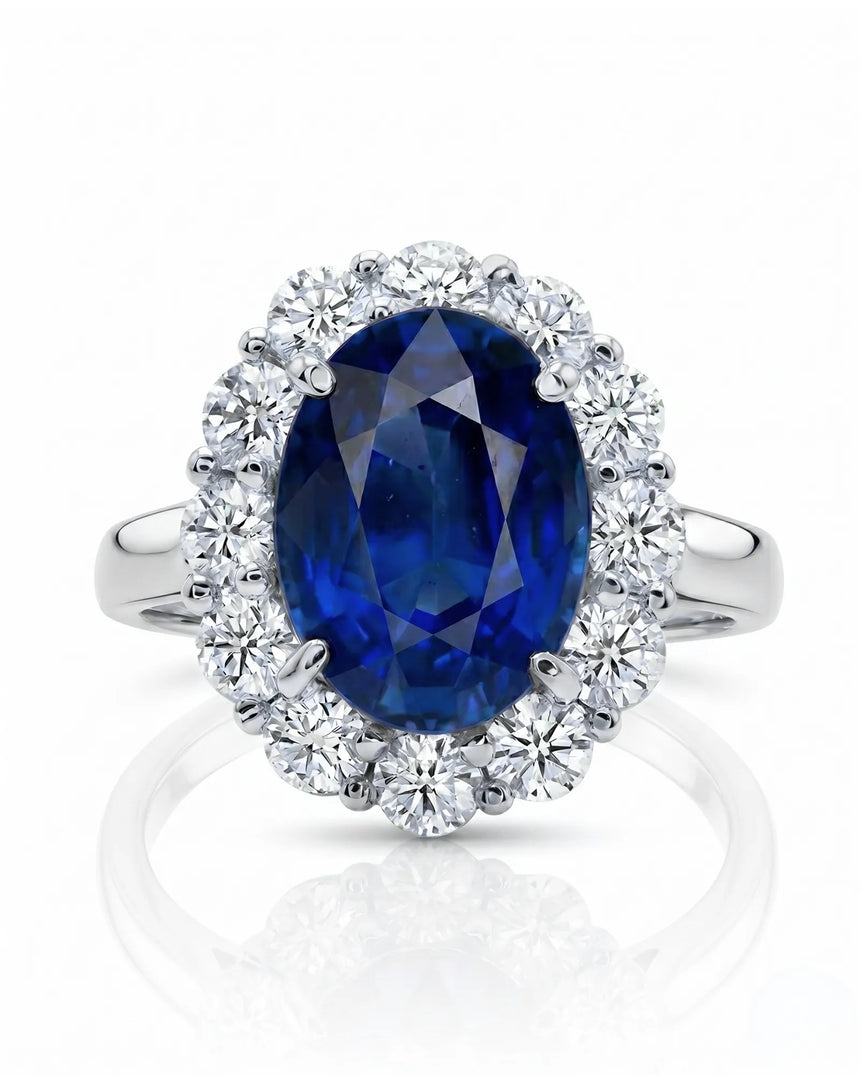 Deep blue oval sapphire ring with bright round diamonds in refined platinum | SARATTI