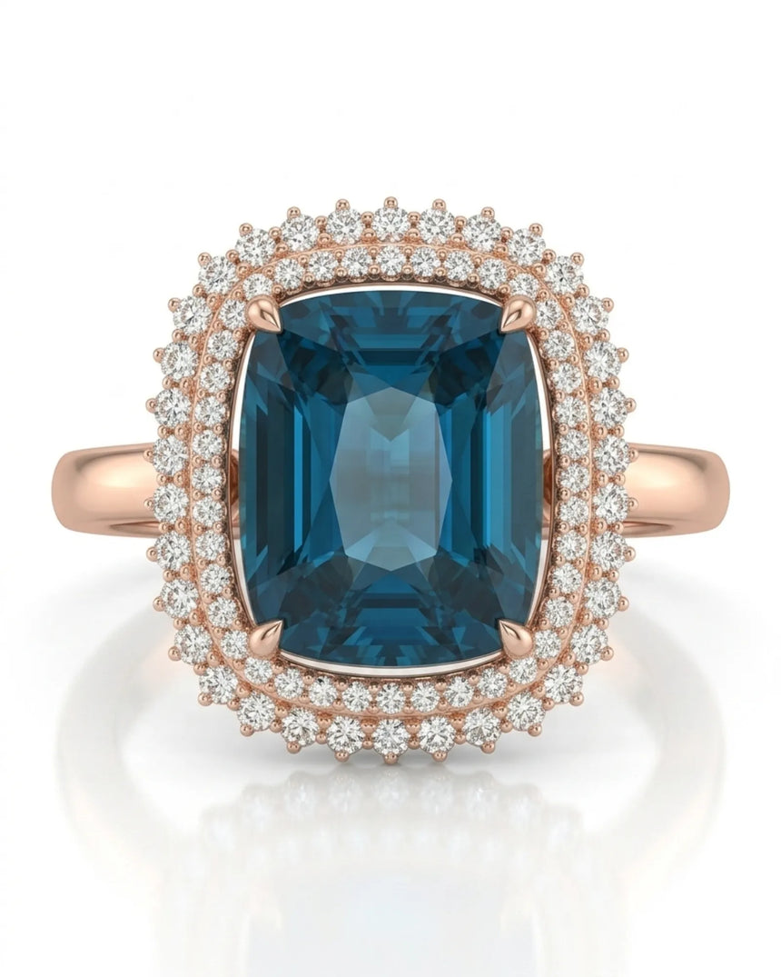 Deep blue tourmaline ring with sparkling diamond halo accents in 18K rose gold | SARATTI