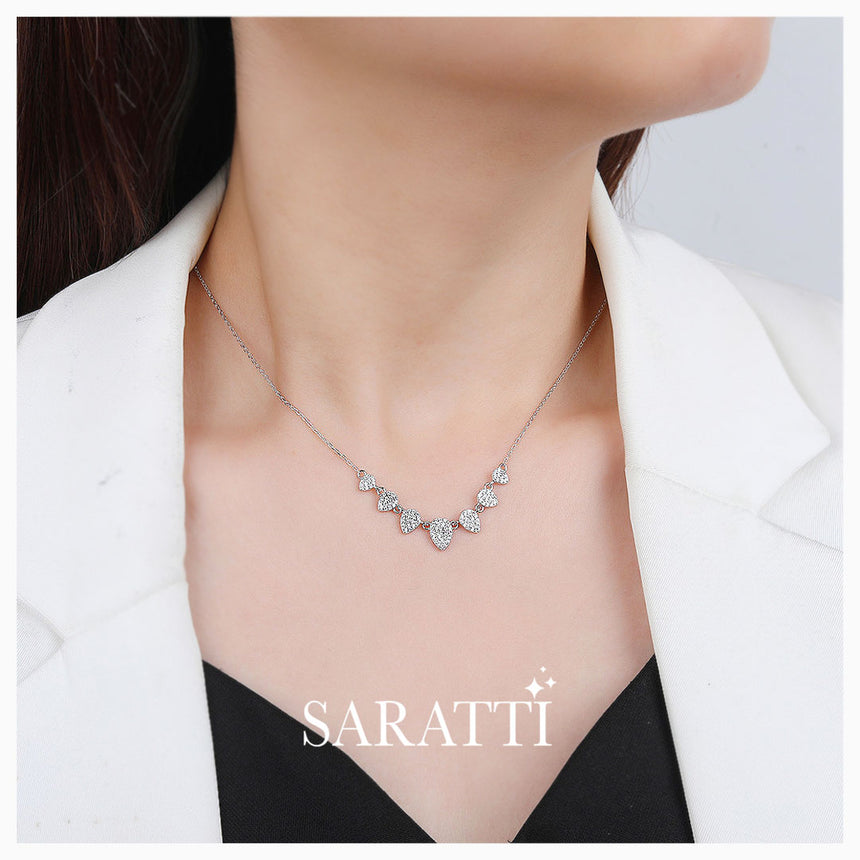 Model wears the Silver Éclat Pavilion Pendant Necklace | Saratti