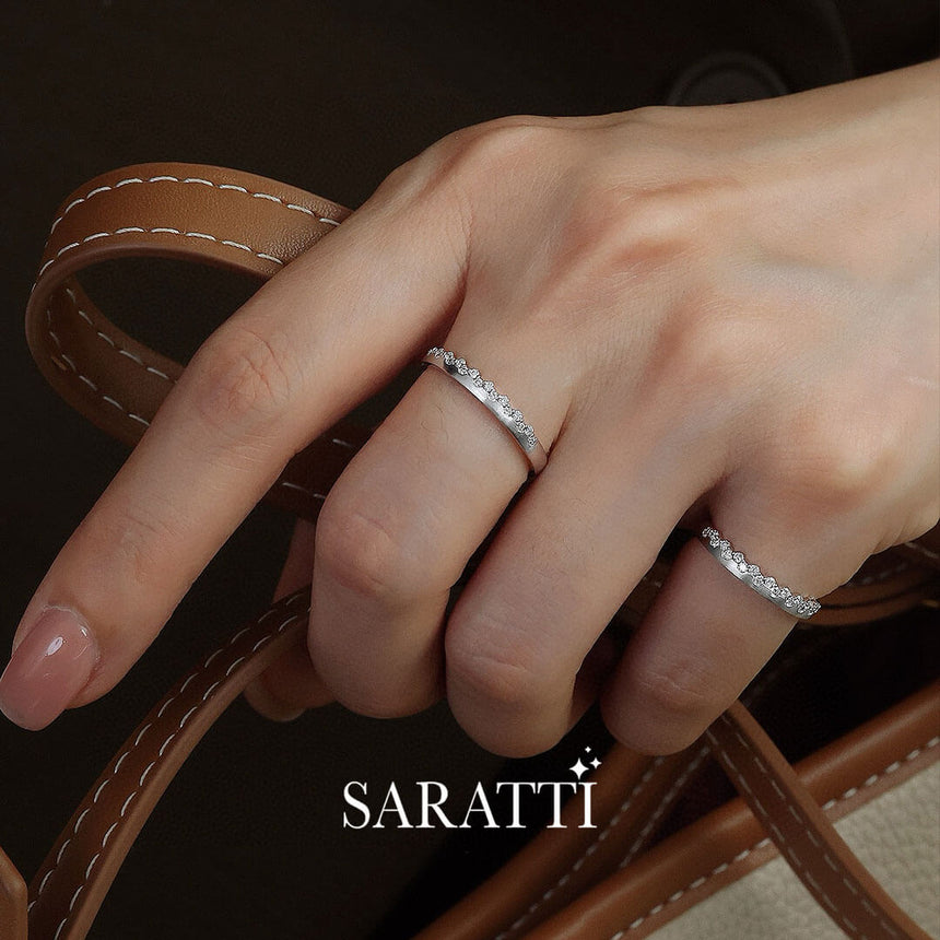 Model Wears Two White Gold Princess Tiara Diamond Eternity Wedding Bands with leather bag | Saratti