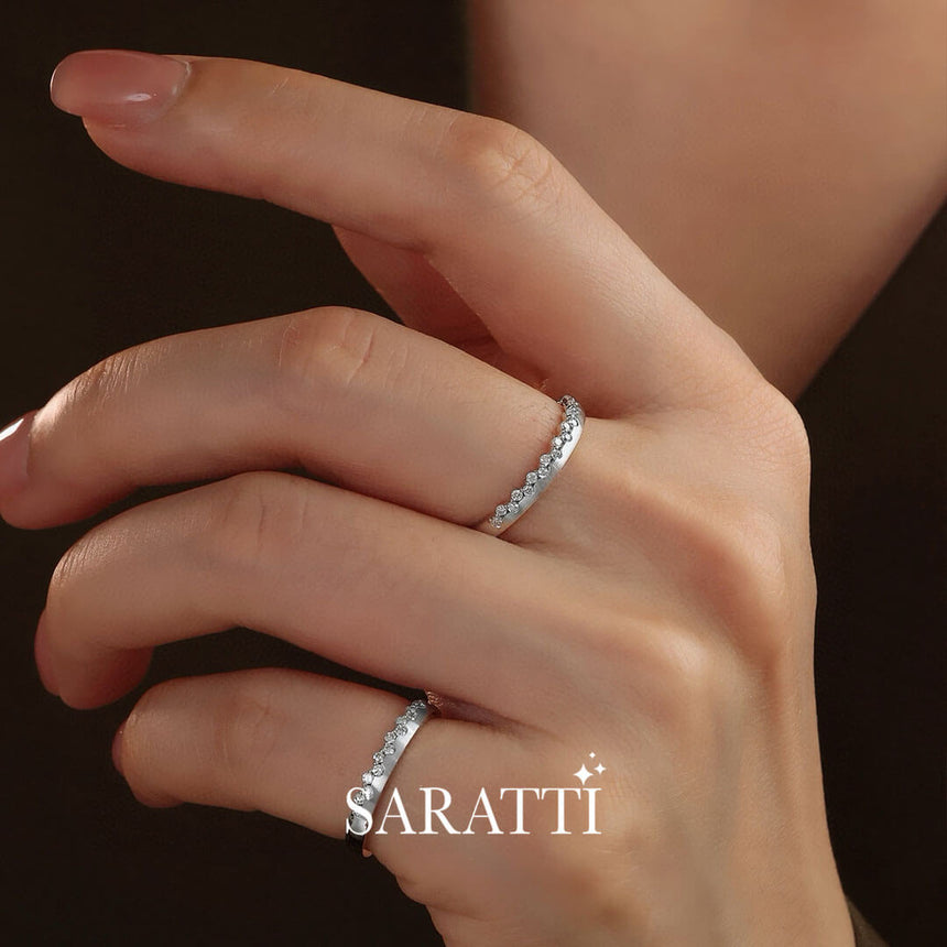 Side Shot of Model's Hand with two Tiara Diamond Eternity Wedding Bands in White Gold | Saratti