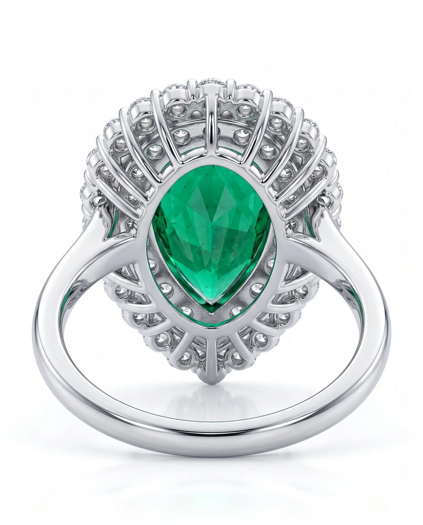 Double halo emerald diamond ring in platinum | SARATTI