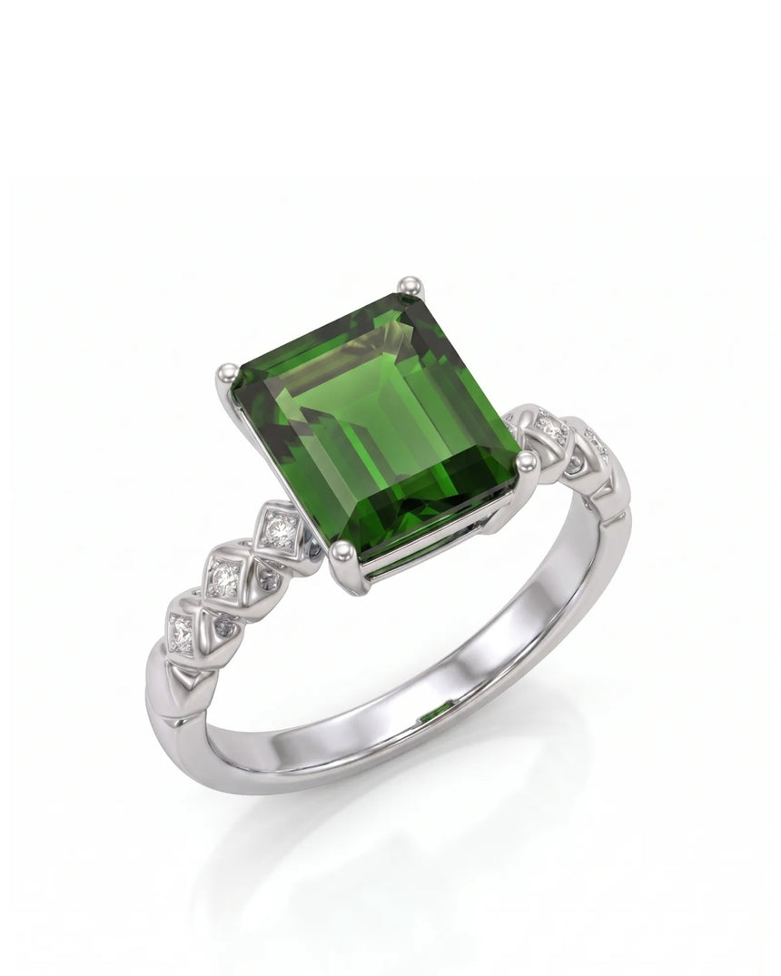 Emerald-cut green tourmaline diamond ring with sculpted geometric shoulders in platinum | SARATTI