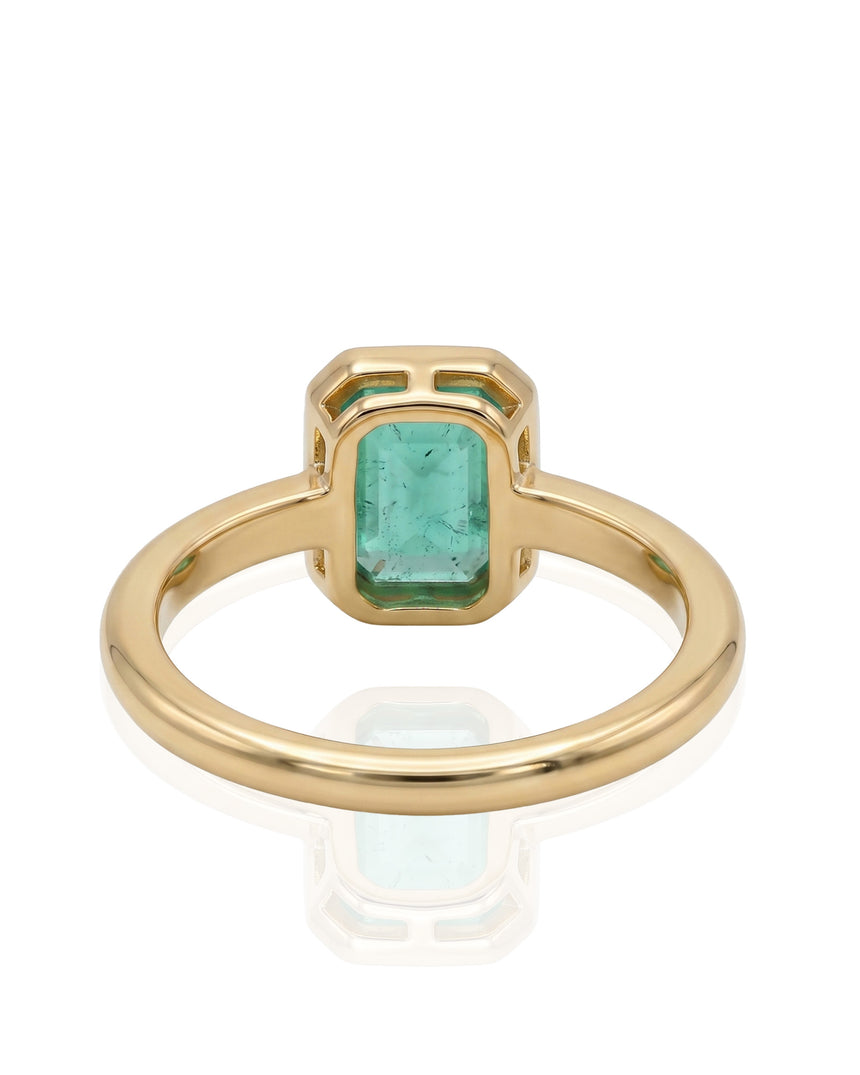 Emerald cut natural emerald ring with clean bezel design in 18K Yellow Gold | SARATTI