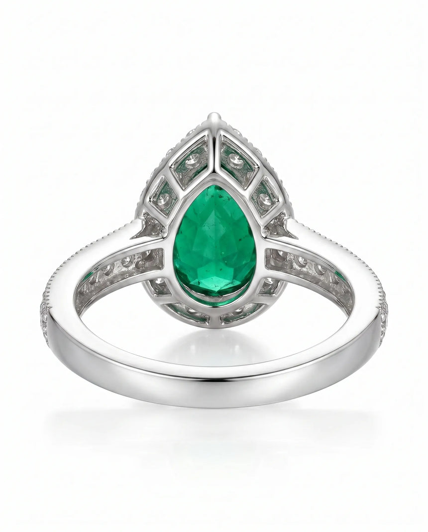Emerald statement ring with diamond band in platinum | SARATTI
