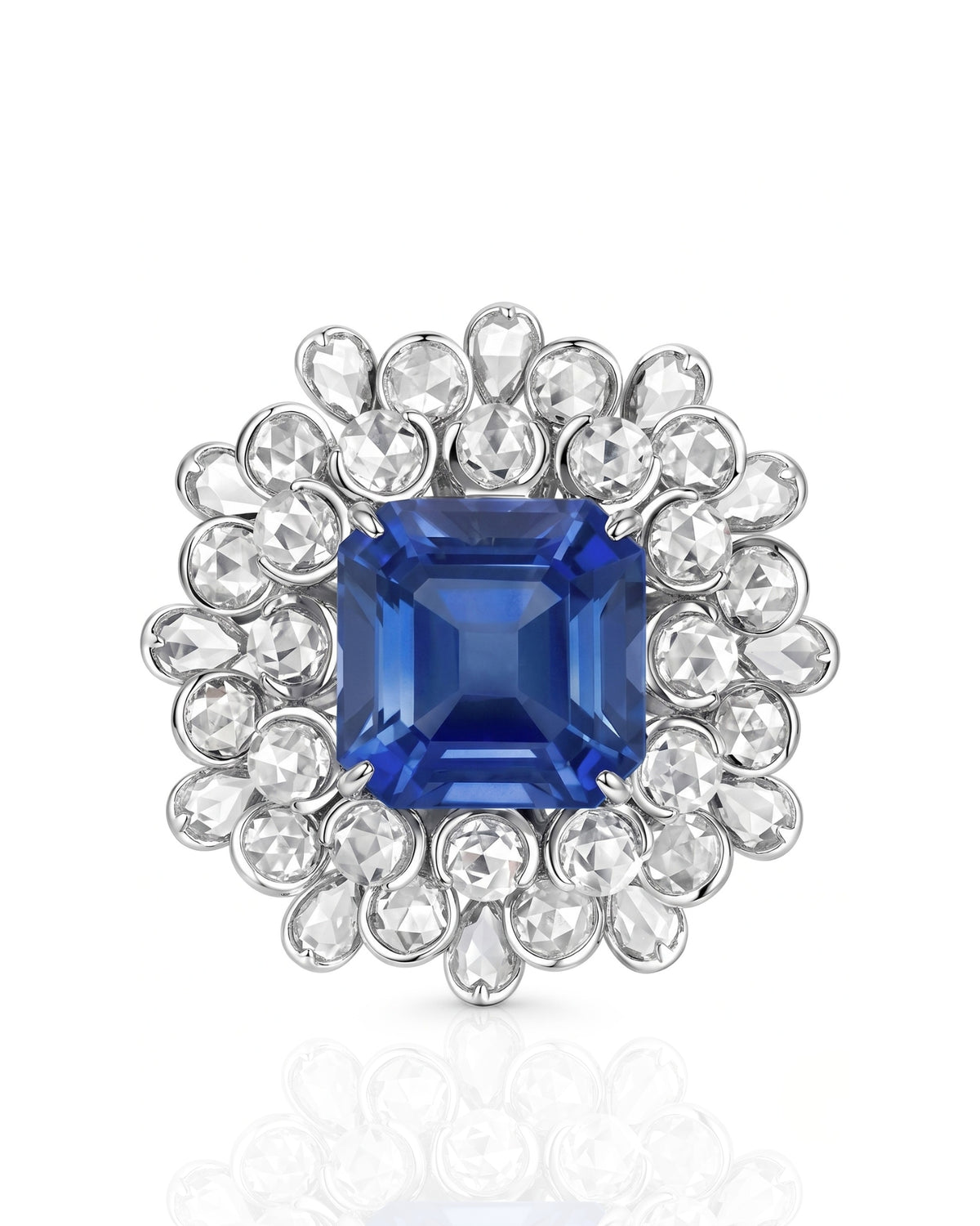 Floral halo sapphire ring with round and pear diamonds in refined platinum | SARATTI