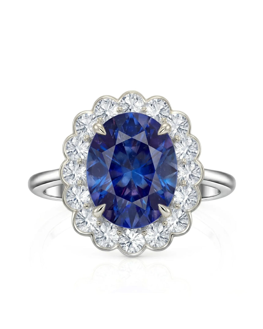 Floral sapphire ring with scalloped round diamond halo in refined platinum | SARATTI