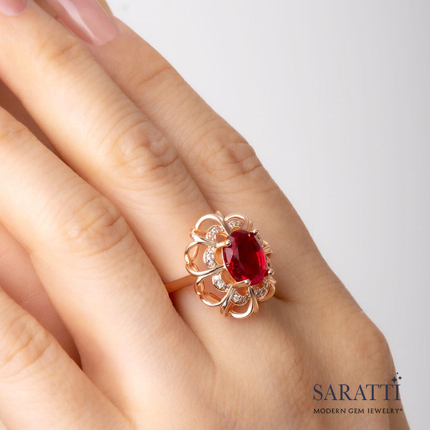Model wears the Coronet Rouge Gold Garnet Ring | Saratti