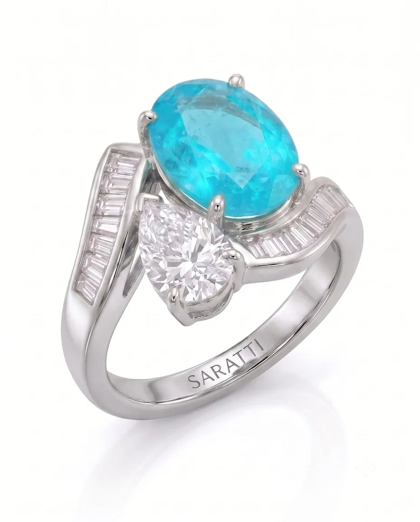 White gold view of Élan Céleste Oval Paraiba Tourmaline and pear diamond Toi et Moi setting | SARATTI