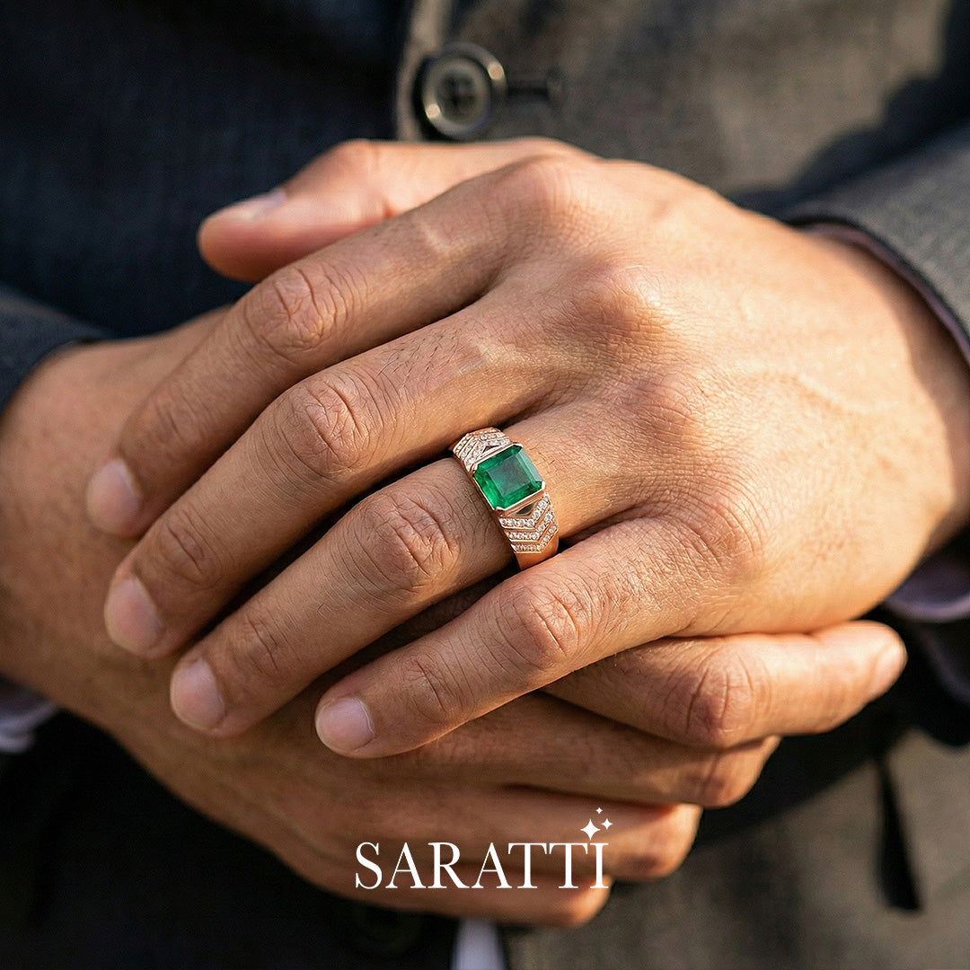 Mens emerald ring emerald cut center stone detail in 18K rose gold | SARATTI