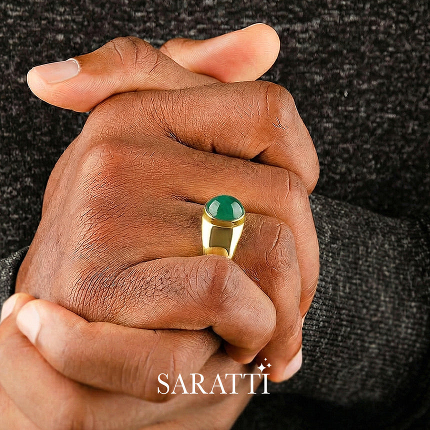 Mens emerald ring oval cabochon worn on model in 18K yellow gold | SARATTI