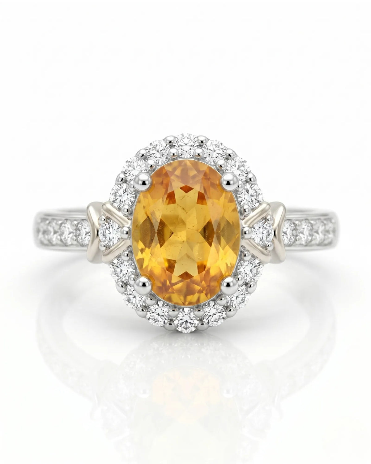 Golden yellow oval sapphire ring with natural diamond accents in 18K white gold | SARATTI