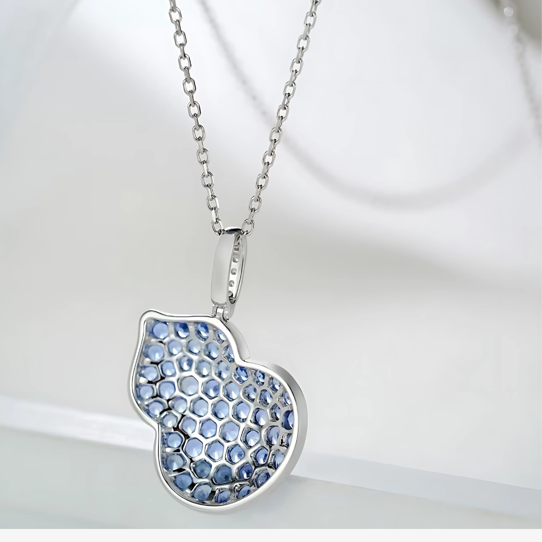 Azure Temptation: Blue Sapphire Apple Pendant Necklace