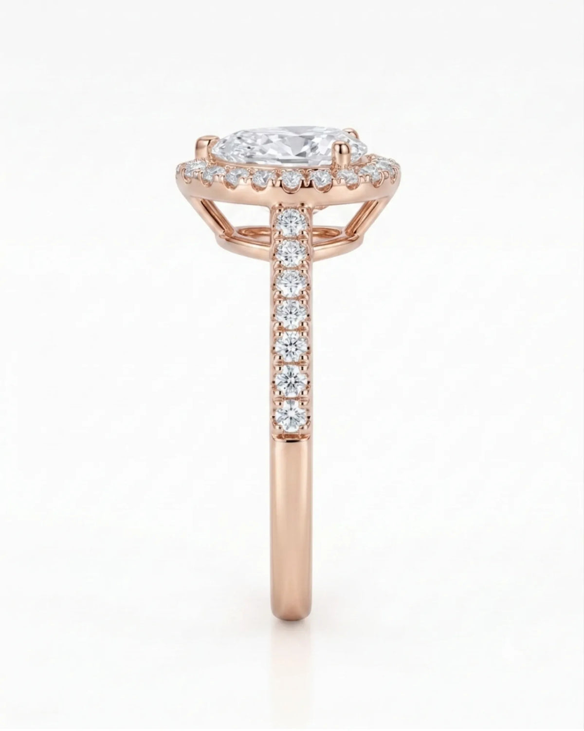 Graceful teardrop moissanite ring with scalloped halo and raised gallery in 18K rose gold | SARATTI