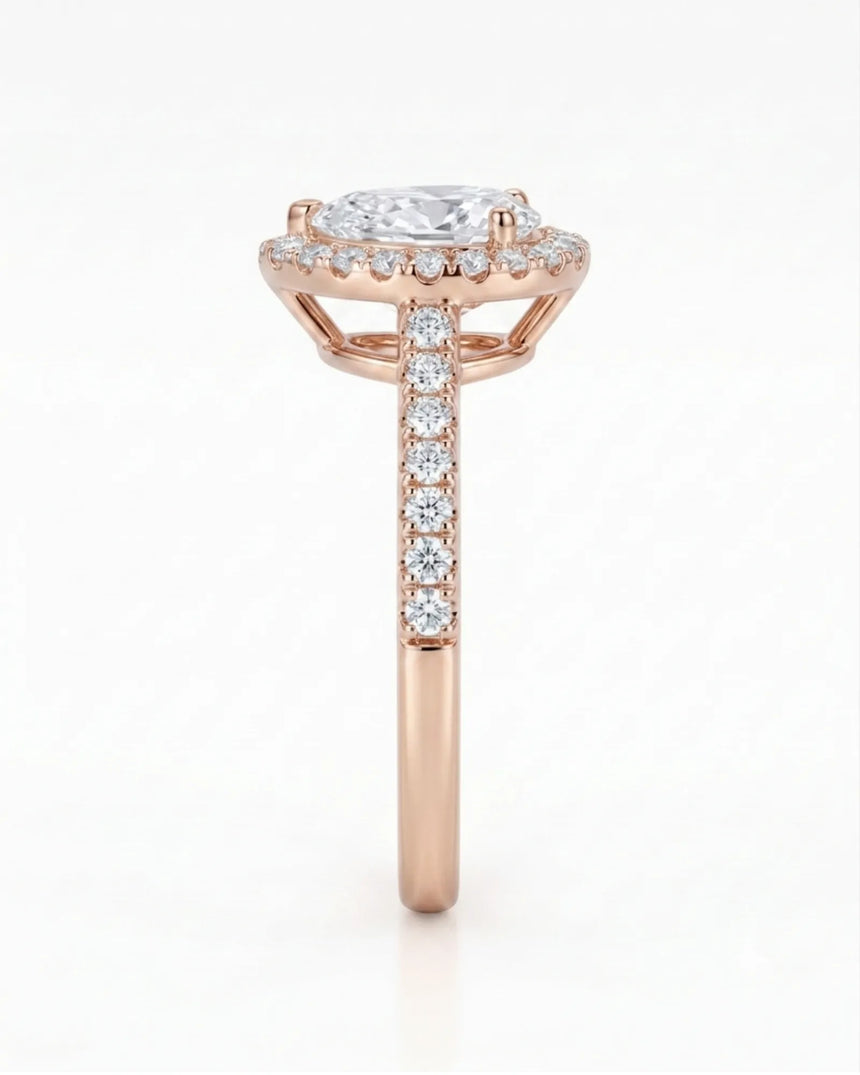 Graceful teardrop moissanite ring with scalloped halo and raised gallery in 18K rose gold | SARATTI