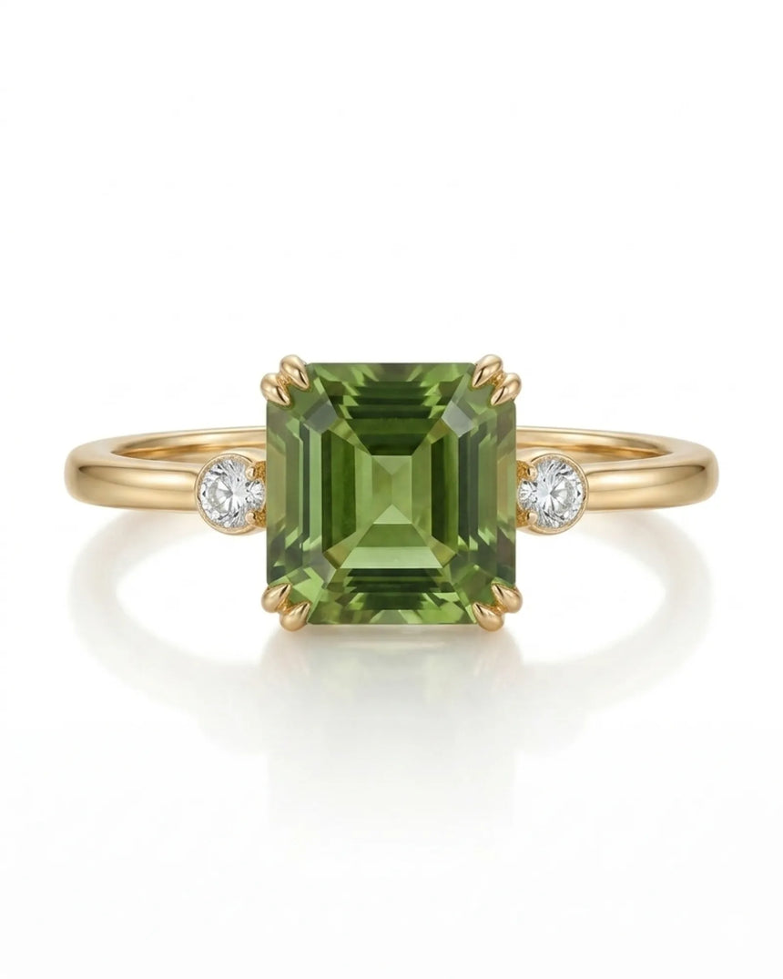 Green Asscher cut tourmaline ring with round diamond side stones in 18K yellow gold | SARATTI