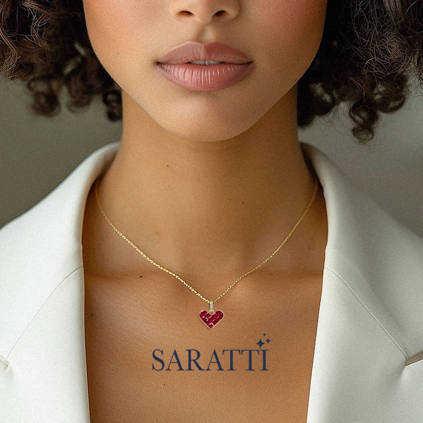 Model sports the Alma Rosa Ruby Heart Necklace | Saratti Fine Jewelry