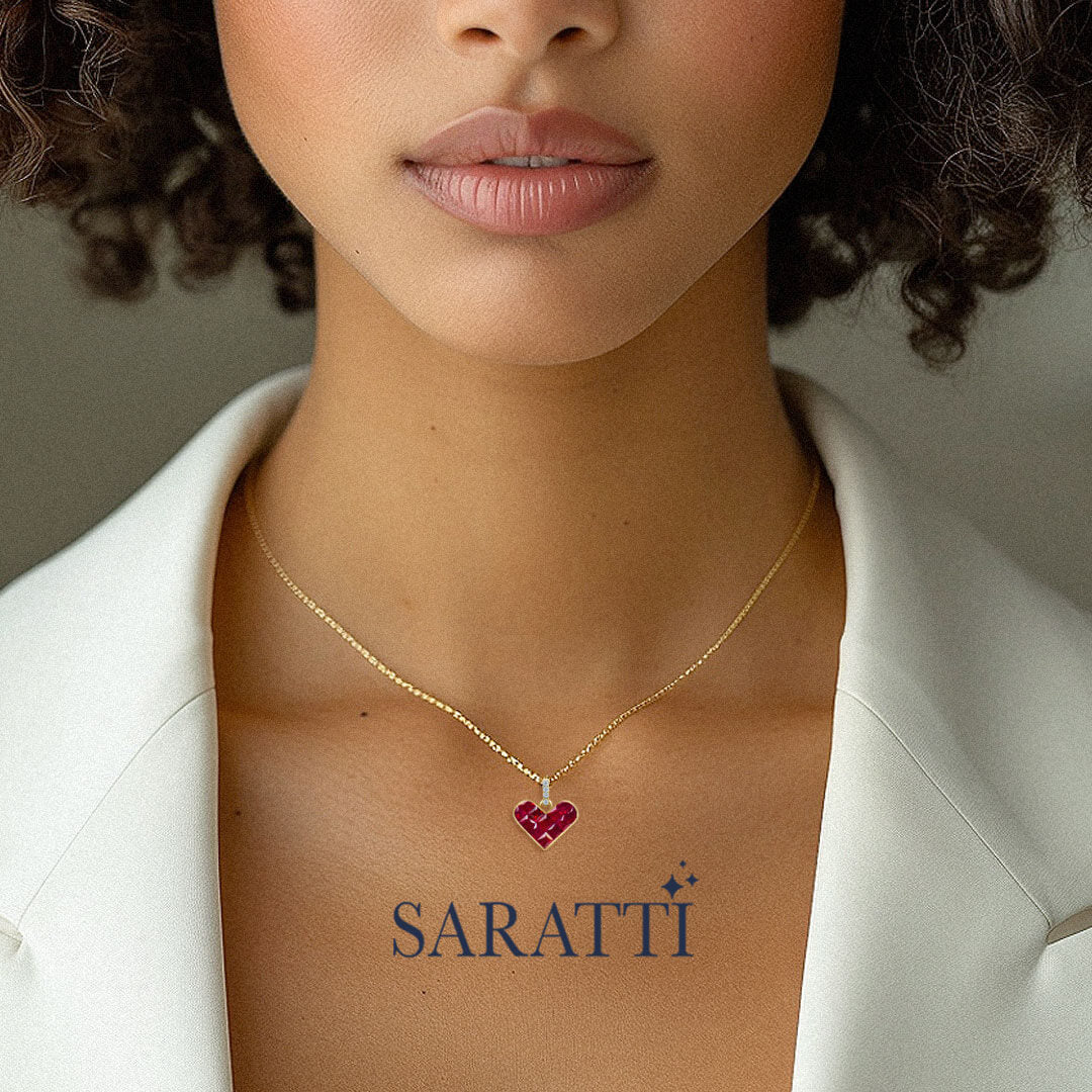 Model sports the Alma Rosa Ruby Heart Necklace | Saratti Fine Jewelry