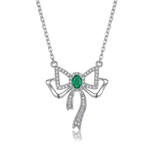 Joyous Bow natural emerald necklace front view | SARATTI