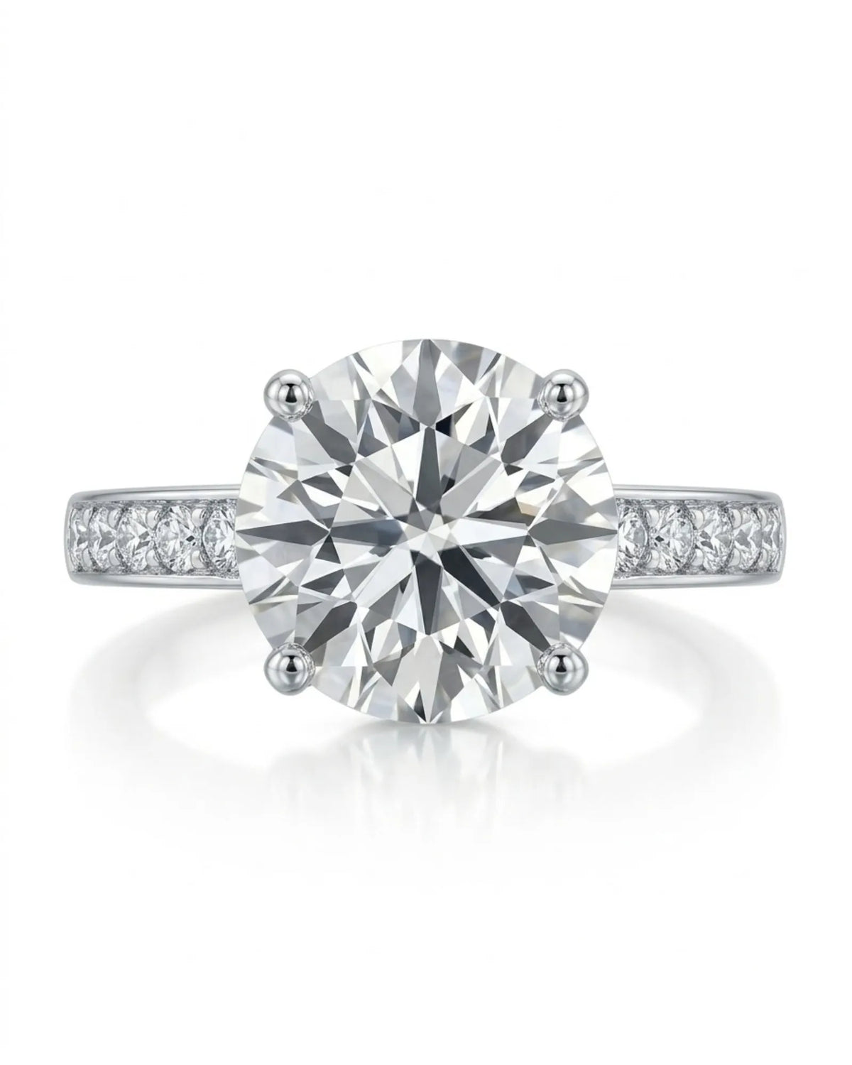 Layla round engagement ring worn on hand with diamond-set band in 18K white gold | SARATTI
