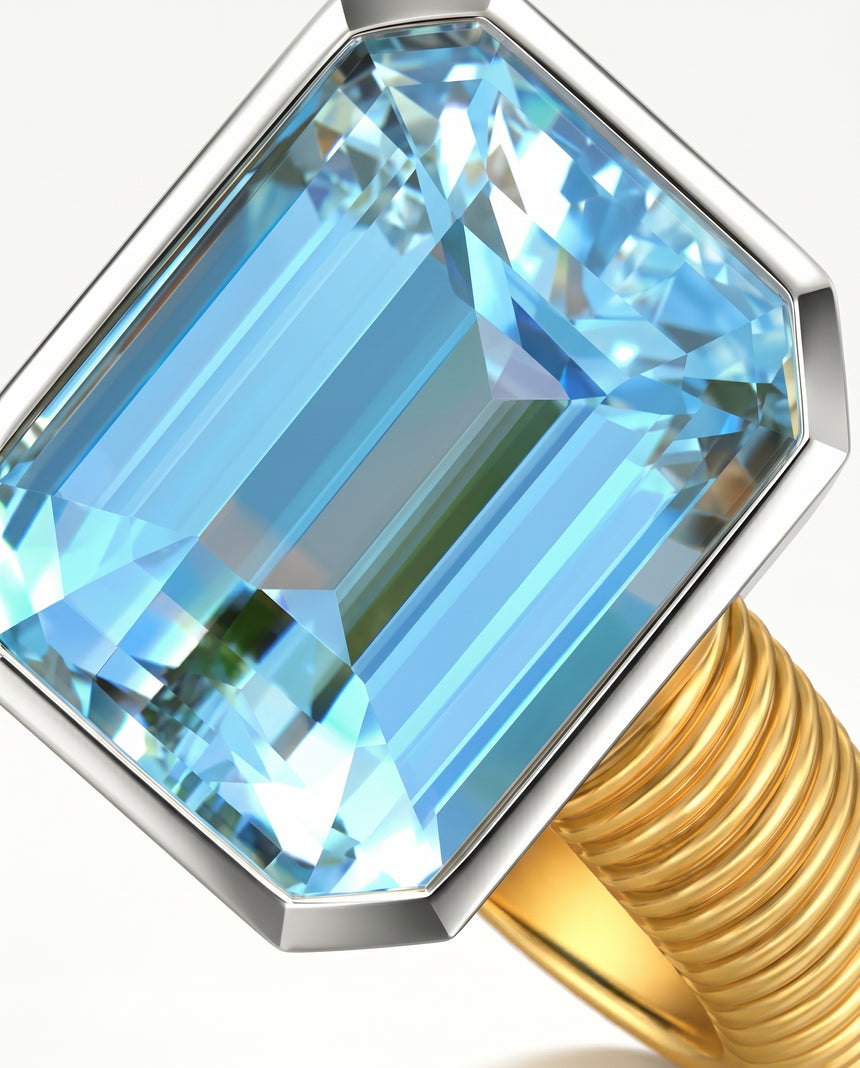 Light sky blue aquamarine ring with emerald cut center stone in 18K Yellow Gold | SARATTI