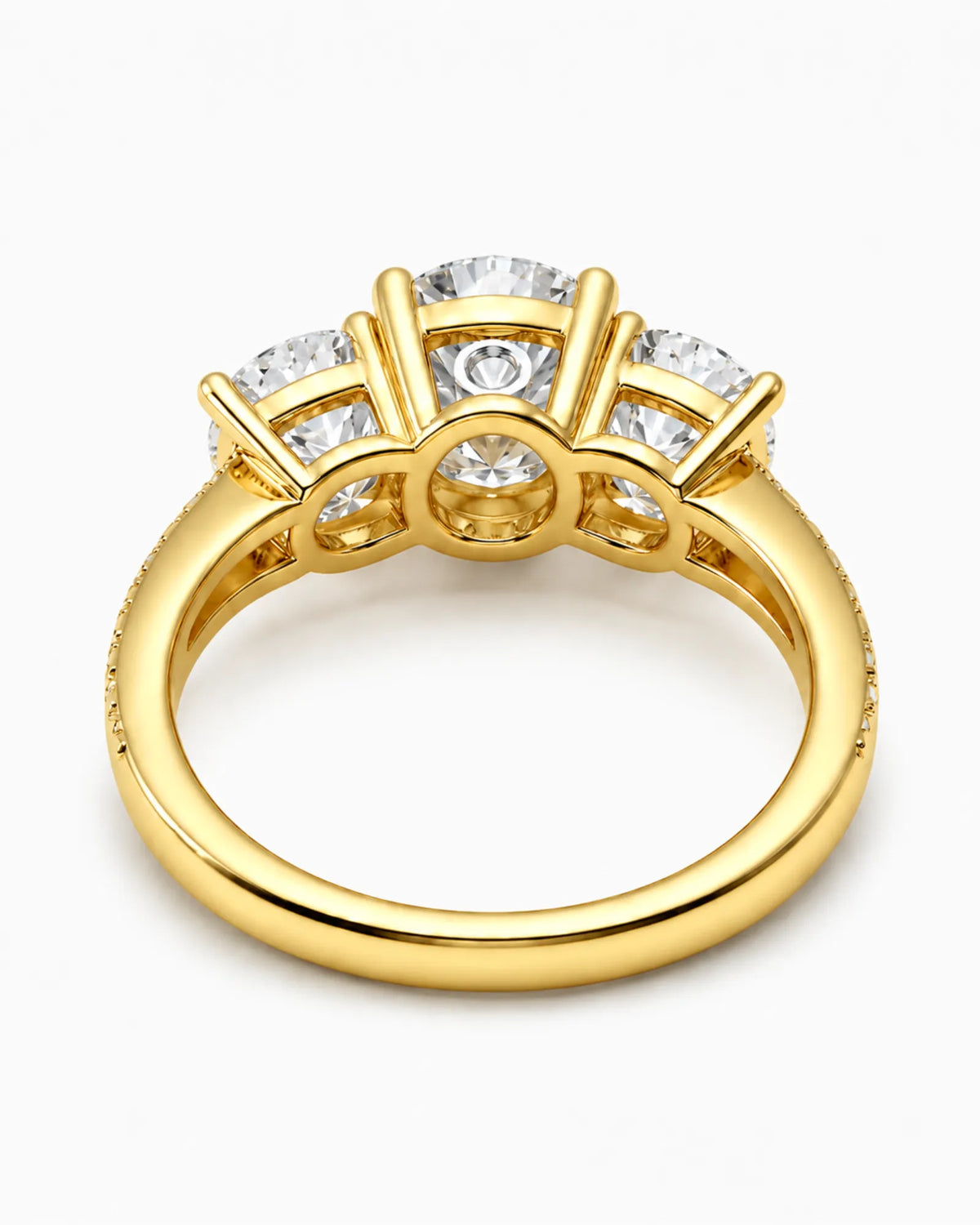 Luxury 18K yellow gold moissanite ring with open baskets and brilliant pavé detailing | SARATTI.
