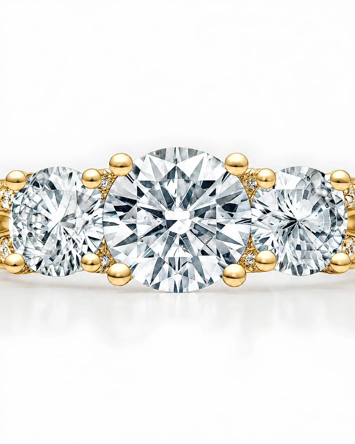 Luxury 18K yellow gold moissanite ring with open baskets and brilliant pavé detailing | SARATTI