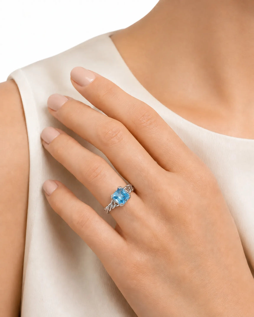 Luxury Asscher cut aquamarine ring in platinum with enduring sculptural detail - SARATTI