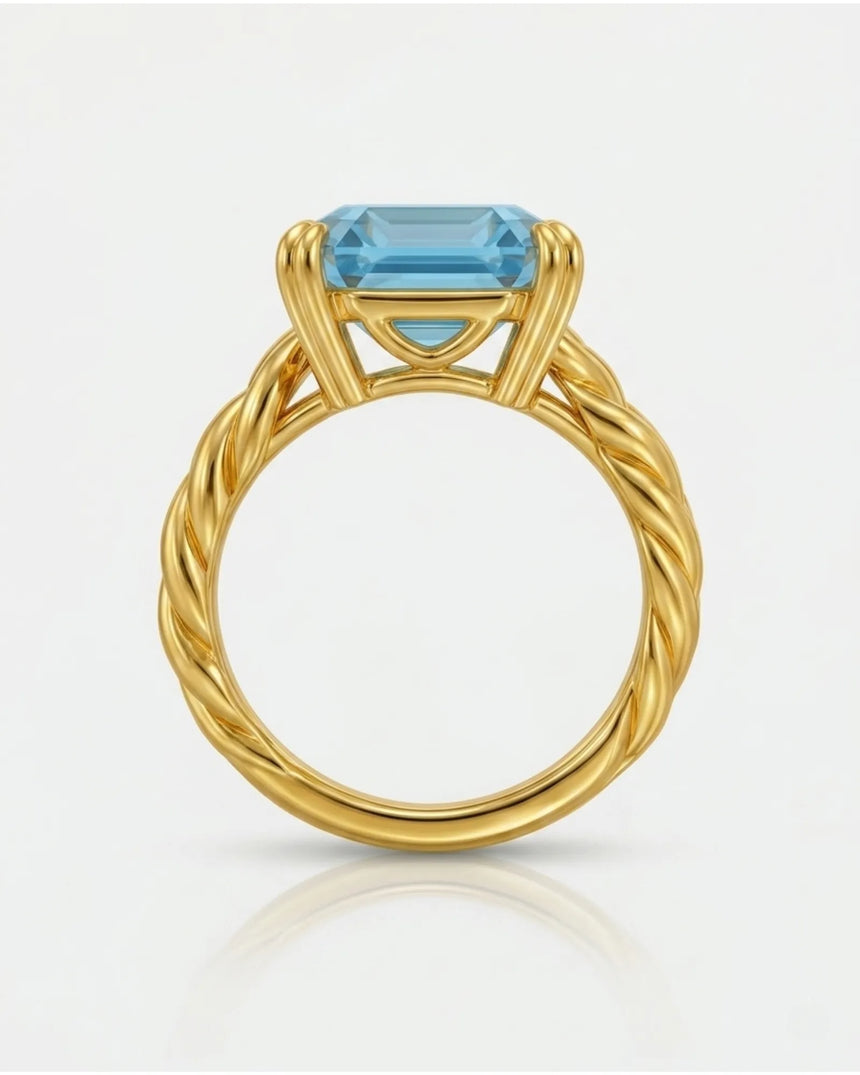 Luxury Asscher cut aquamarine ring in yellow gold with warm sculptural detail - SARATTI
