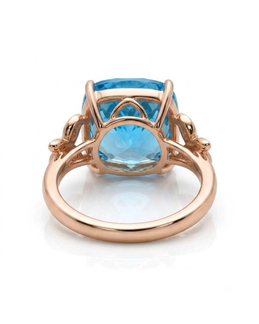 Luxury Swiss Blue topaz statement ring with sculpted diamond shoulders in 18K rose gold - SARATTI