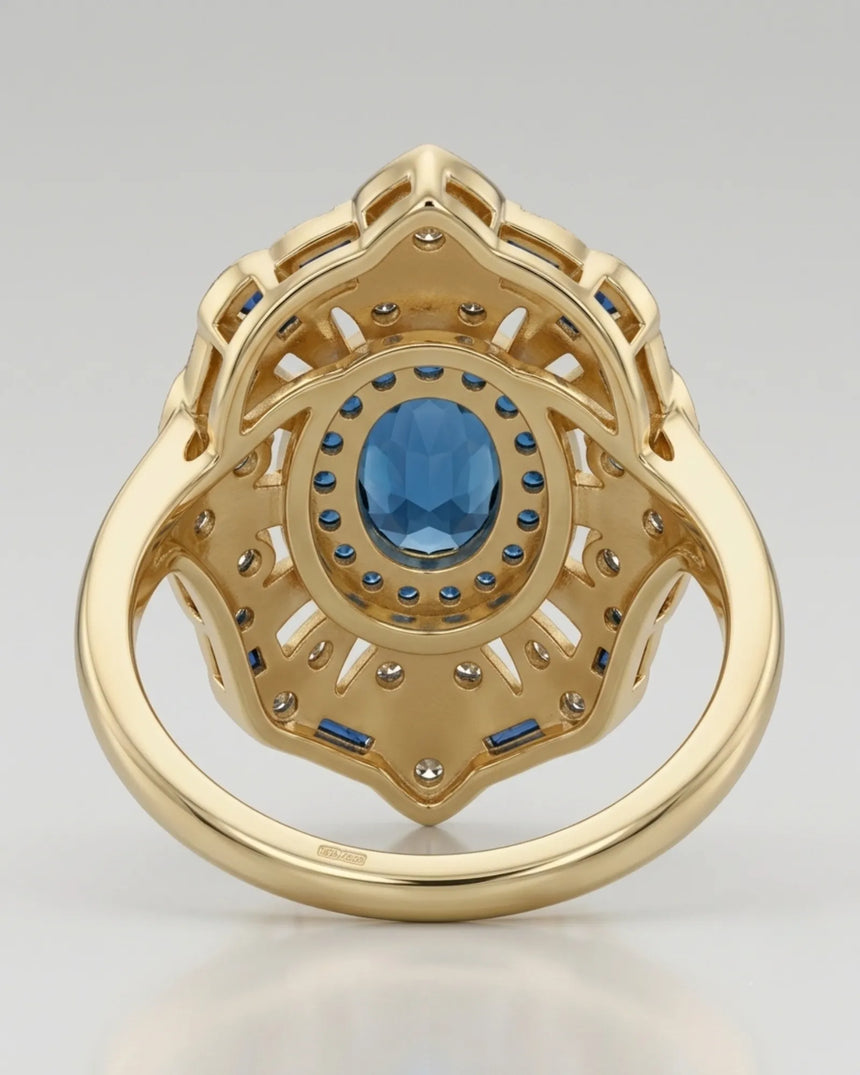 Luxury architectural topaz cocktail ring with blue accents and diamonds in 18K yellow gold - SARATTI