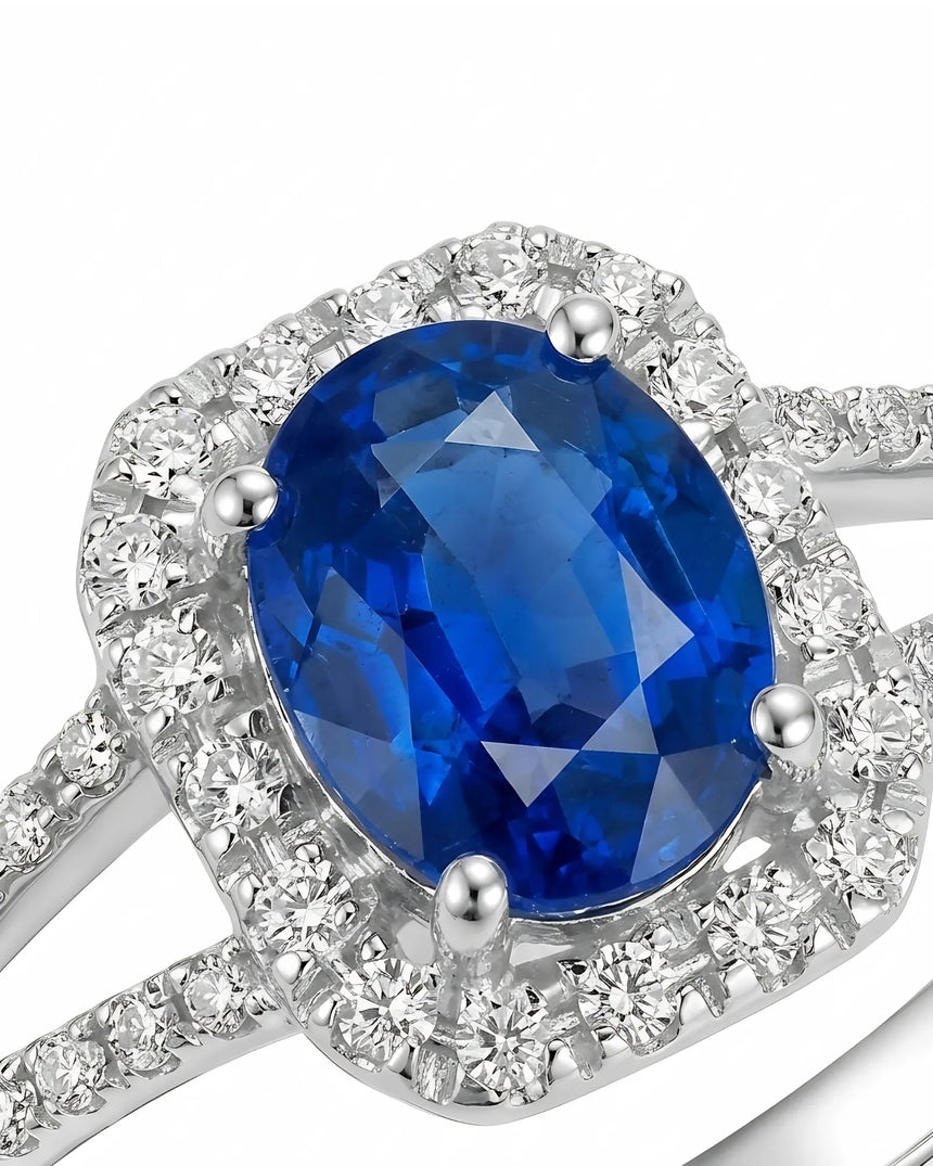 Luxury blue sapphire diamond ring with refined split shank design in platinum | SARATTI