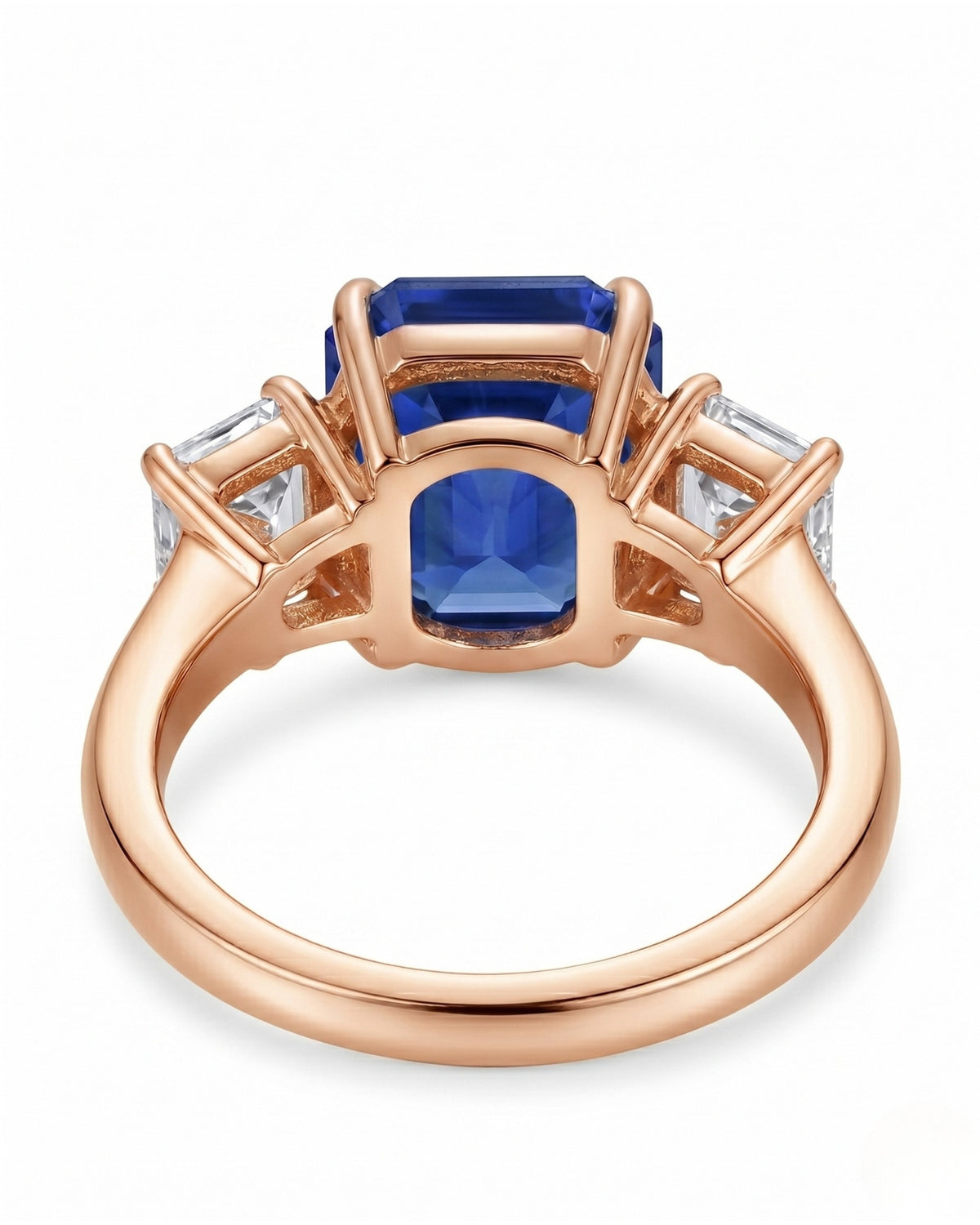Luxury emerald cut sapphire statement ring with diamond accents in 18K rose gold | SARATTI