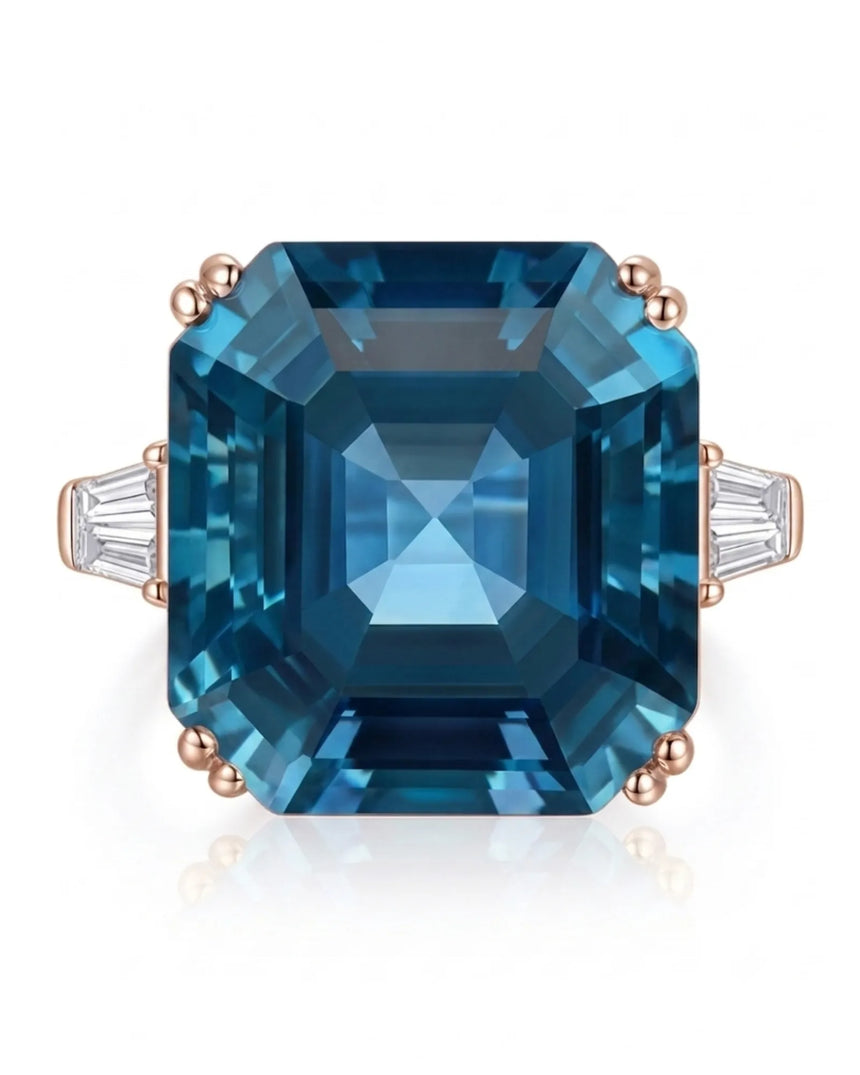 Luxury geometric topaz statement ring with diamond side stones in polished 18K rose gold | SARATTI