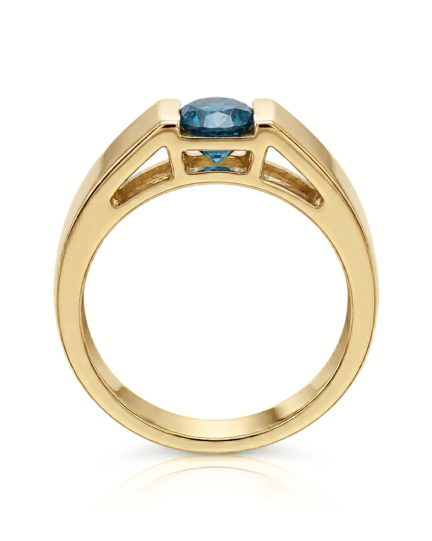 Luxury men’s ring with tension-set blue diamond and substantial 18K yellow gold profile | SARATTI