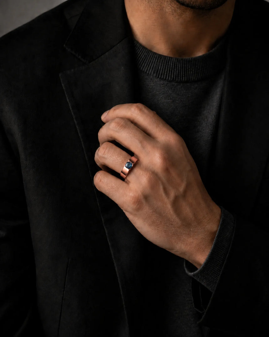 Luxury men’s ring with vivid blue diamond and structured 18K rose gold design | SARATTI