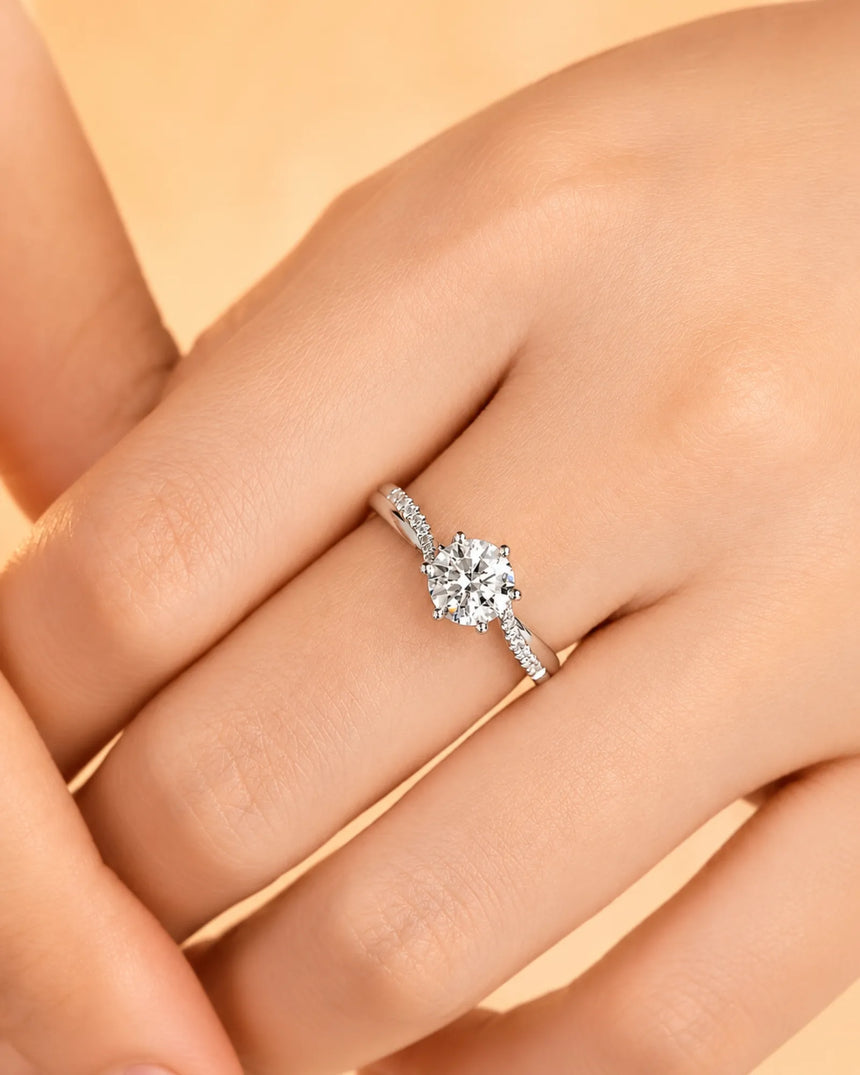 Luxury natural diamond ring with round center stone and refined white gold pavé band | SARATTI