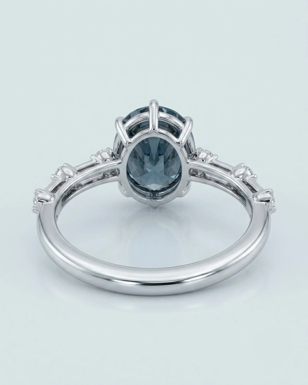 Luxury oval blue moissanite ring with accent stones and polished white gold finish - SARATTI