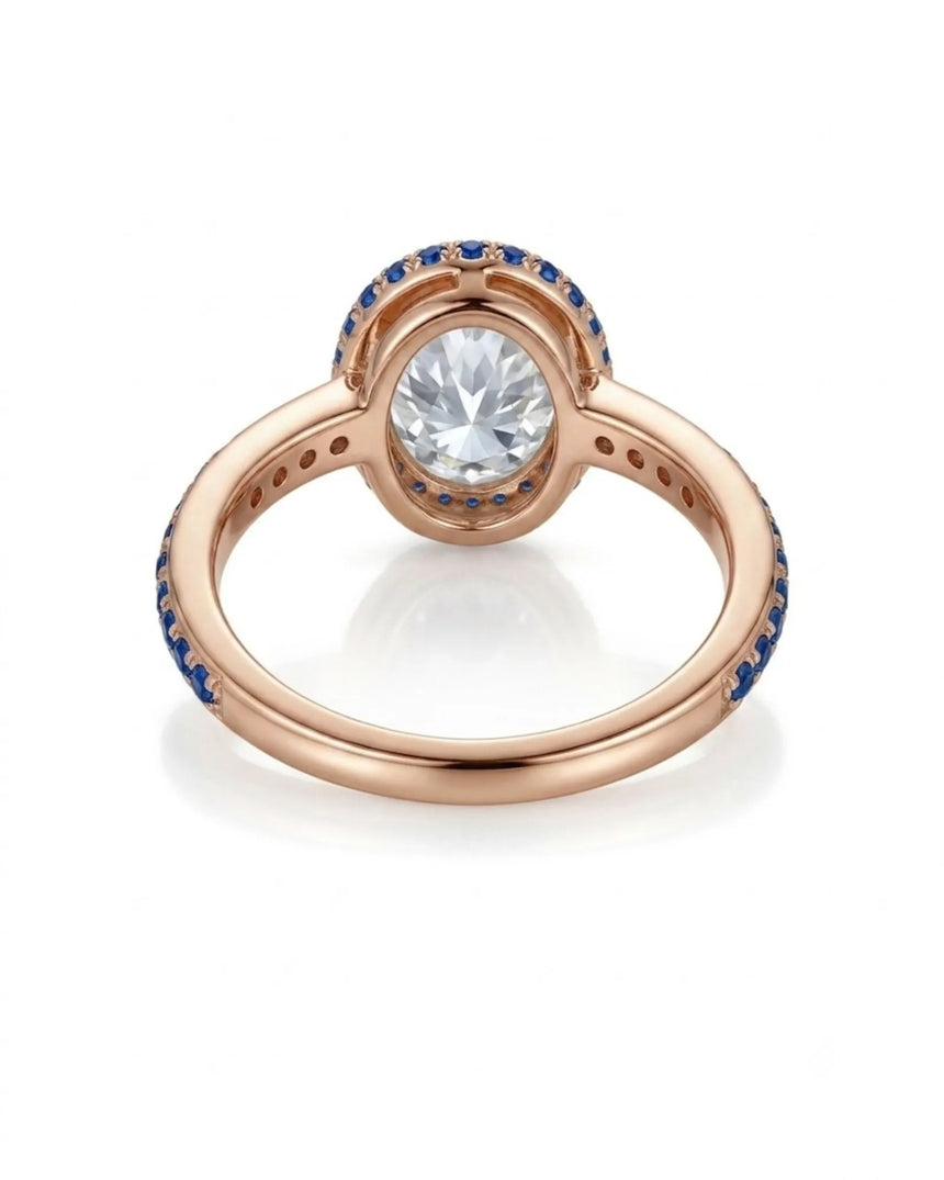 Luxury oval moissanite and natural sapphire ring with protective bezel in 18K rose gold - SARATTI