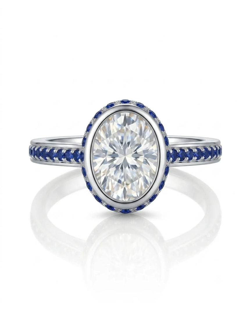 Luxury oval moissanite and natural sapphire ring with protective bezel in polished platinum - SARATTI