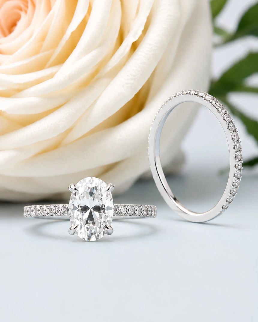 Luxury oval moissanite bridal set with matching pavé bands and refined 18K white gold craftsmanship | SARATTI