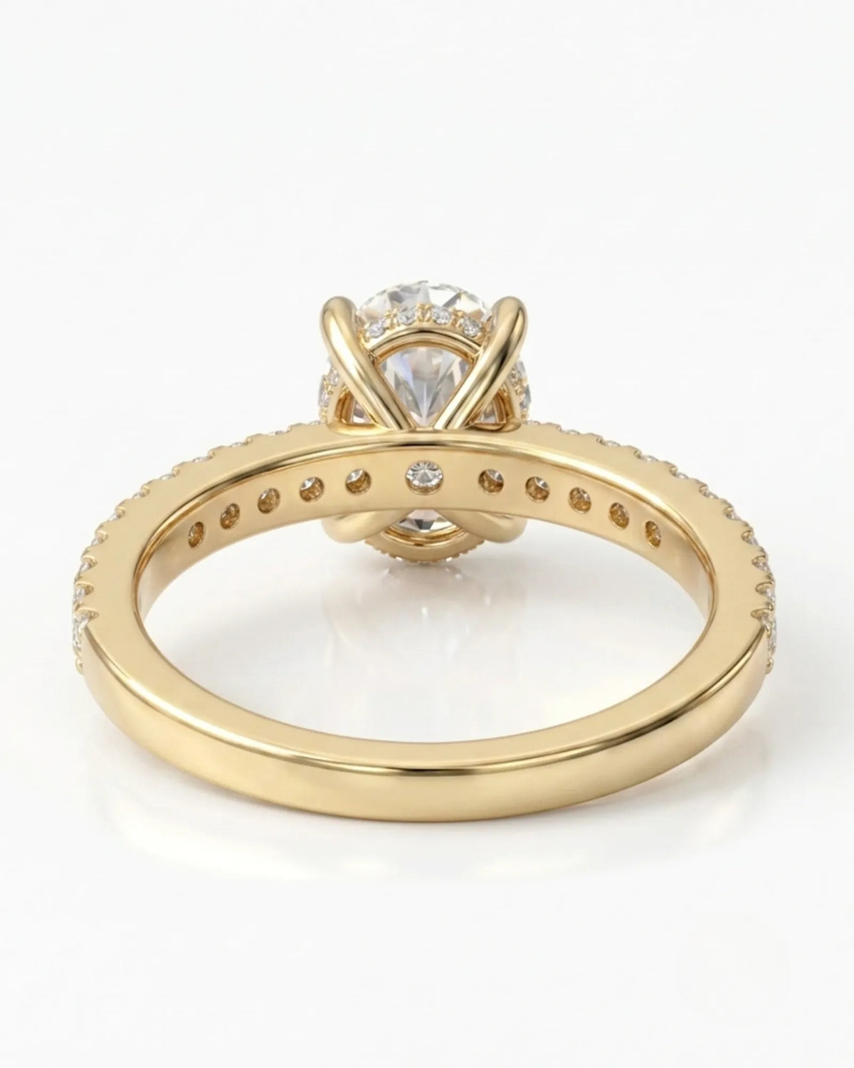 Luxury oval moissanite bridal set with matching pavé bands and rich 18K yellow gold craftsmanship - SARATTI