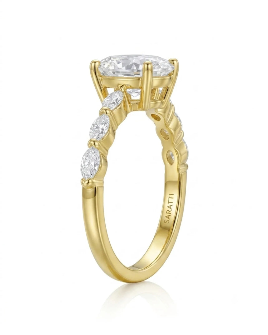 Luxury oval moissanite engagement ring with royal marquise detailing and 18K yellow gold craftsmanship -- SARATTI