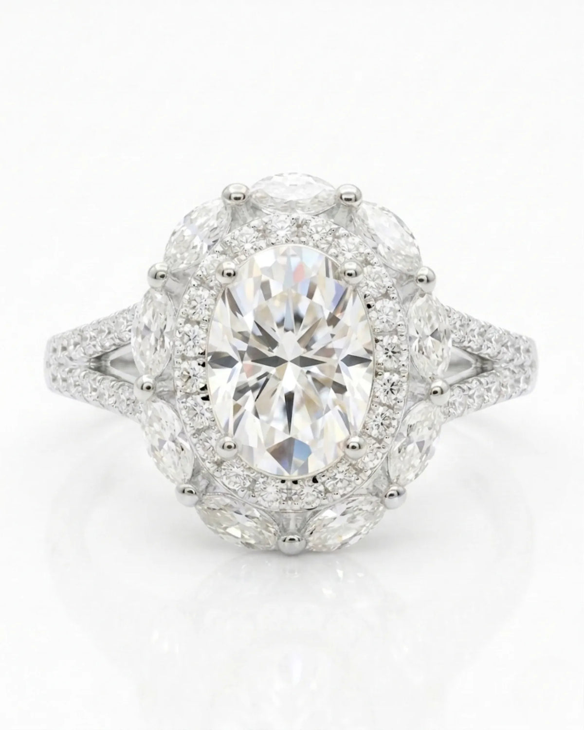 Luxury oval moissanite ring with floral halo and pavé split shank in white gold | SARATTI