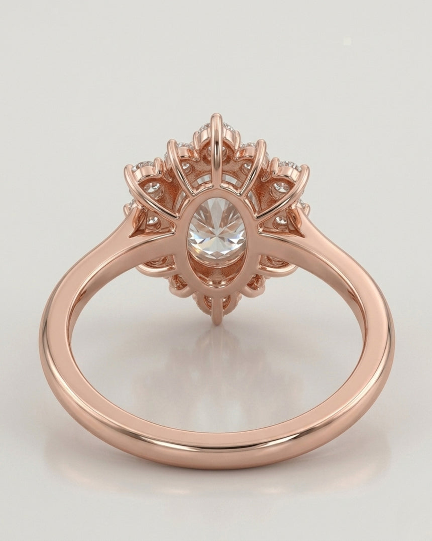 Luxury oval moissanite ring with floral halo and warm rose gold setting | SARATTI