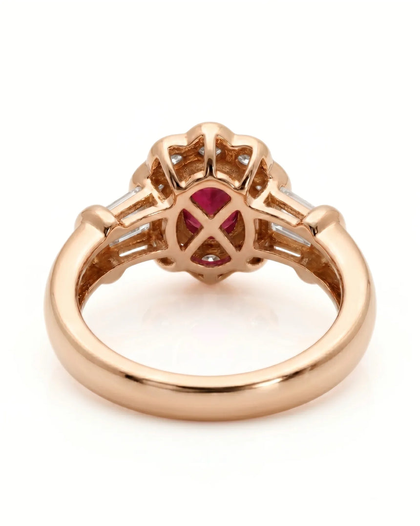 Luxury oval ruby halo ring with diamond accents in refined rose gold | SARATTI